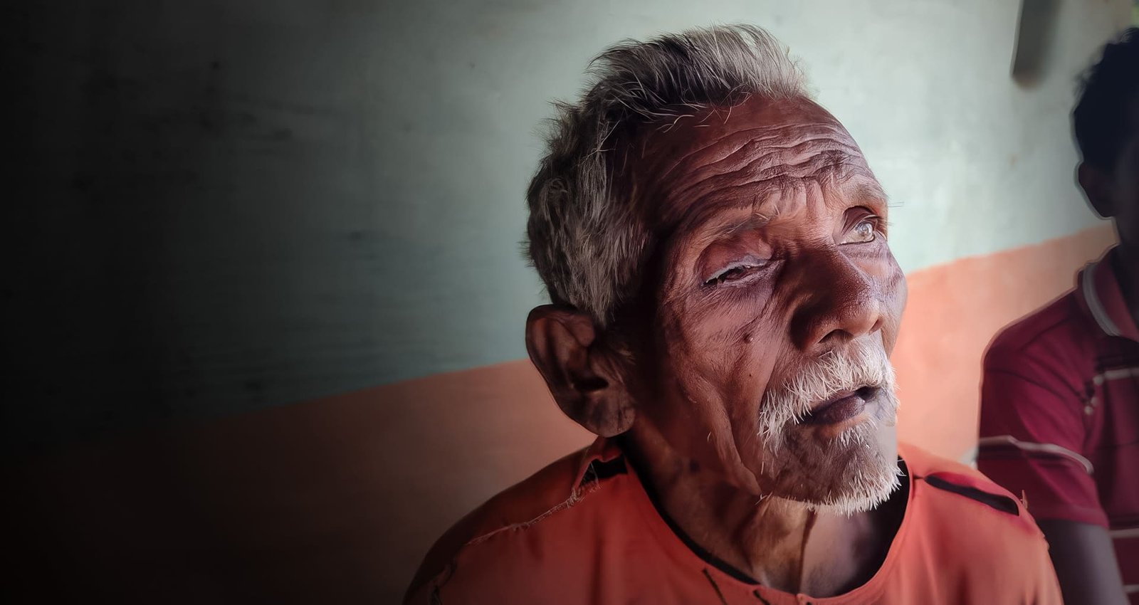 Elderly patient looking up with hope